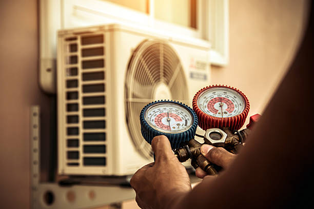 Professional Ductwork Repair technician working in Harrington, DE
